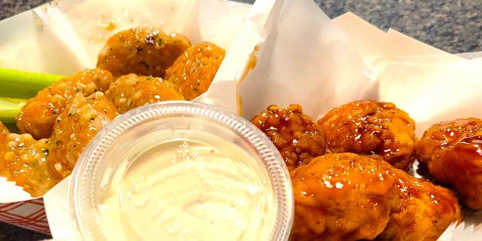 Boneless chicken wings from lunch and dinener appetizers menu at Pineland Grille in Arkdale WI