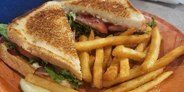 BLT sandwich from lunch and dinner menu at Pineland Grille in Arkdale WI