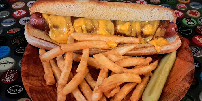 hot dog and french fries with a pickle